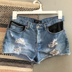 High waisted button up pleather pocket shorts